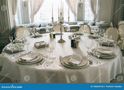 Elegant Dining Table Setting in the Restaurant for the Wedding Dinner ...