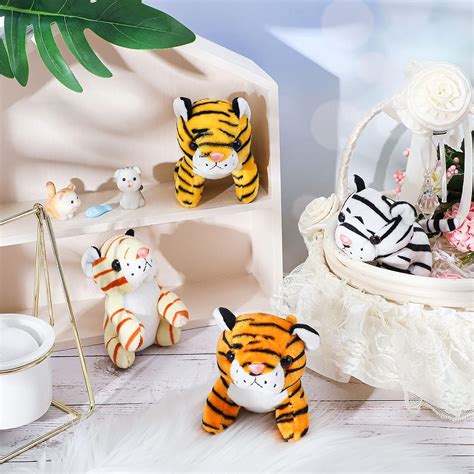 Buy 8 Pieces Mini Stuffed Wild Animals Jungle Animal Plush Toys in 4 ...