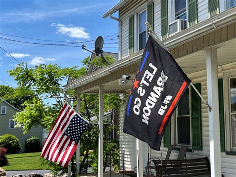 Trump supporters turn US flags upside down to protest guilty verdict ...