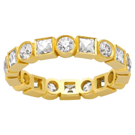 Single Stone Kelly 18k Yellow Gold Diamond Eternity Band For Sale at ...