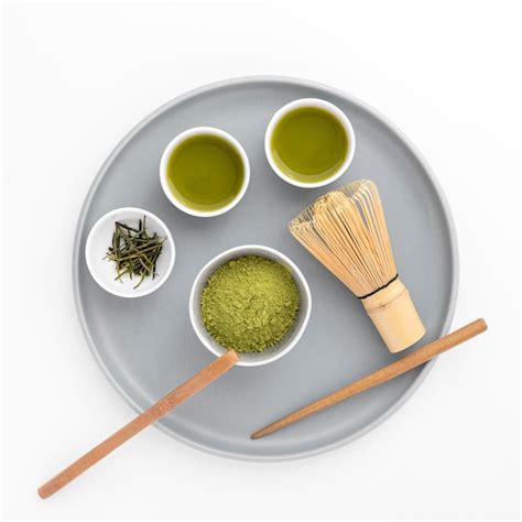 Top view matcha powder with bamboo whisk | Free Photo