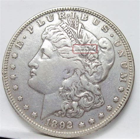 1892 O Morgan Silver Dollar.