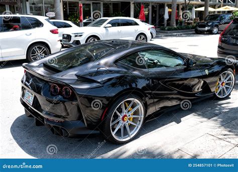 Miami Beach, Florida USA - April 15, 2021: Black Ferrari F12 Berlinetta Supercar, Side Corner ...