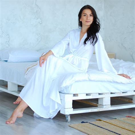 Bride Julia, in a long silk satin floor-length robe. 😍 | White bridal ...