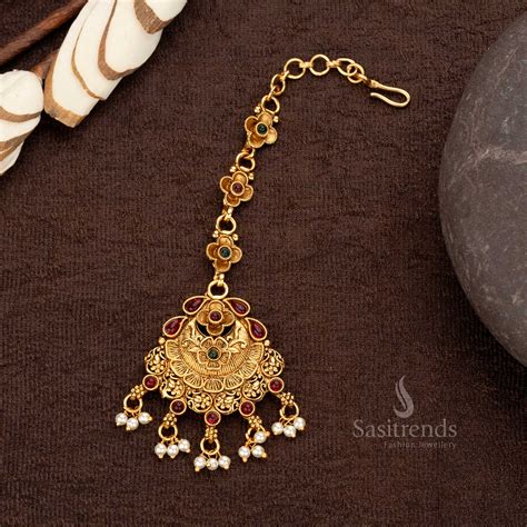 Matte Gold Plated Floral Maang Tikka with Pearl Hangings - sasitrends ...