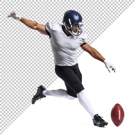Focused american football athlete in white performing field goal kick ...