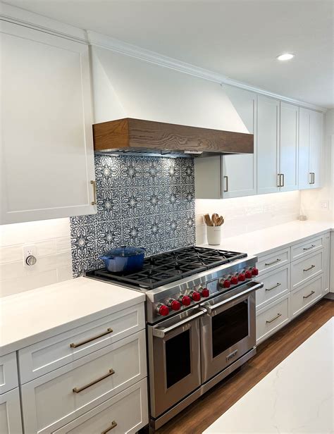 Spanish Inspired Blue Backsplash with White Cabinets