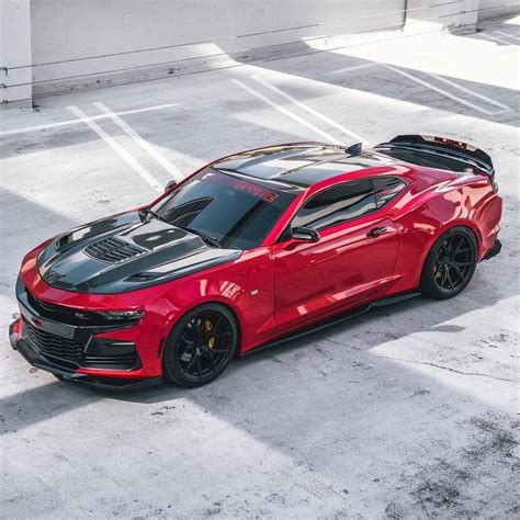 Red Chevrolet Camaro with Black Stripes