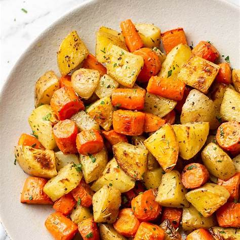 https://www.saltandlavender.com/wp-content/uploads/2021/03/roasted-potatoes-and-carrots-5.jpg