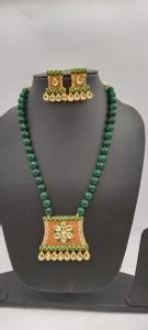 Diamond Dazzle Brass Gold-plated Green Jewellery Set Price in India ...
