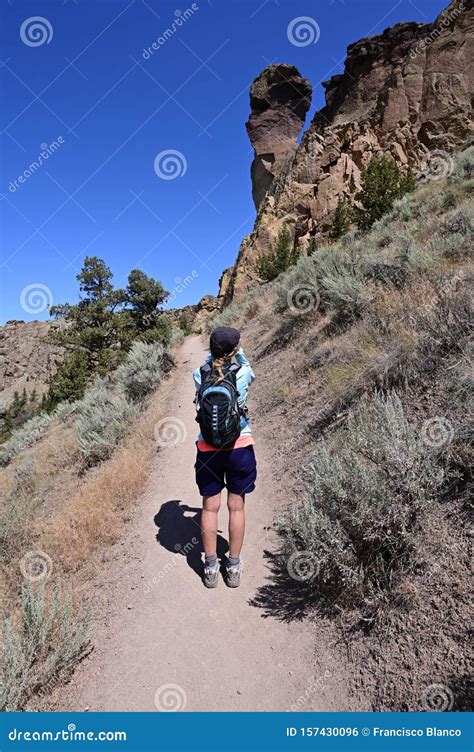 Woman on Misery Ridge Trail in Smith Rock State Park, Oregon. Stock ...