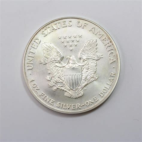 1999 Silver Colorized Walking Liberty One Dollar Coin | Property Room