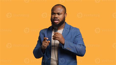 African american motivational speaker holding monologue using ...
