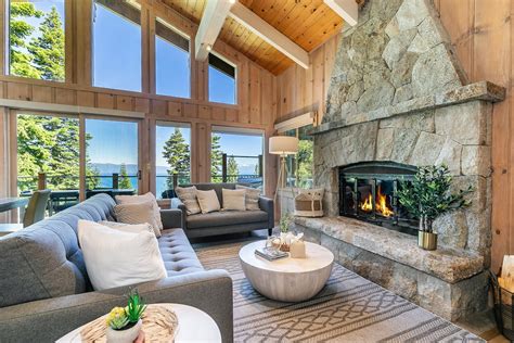 Elegant living room in a Luxe Tahoe City Cabin, showcasing a fireplace ...
