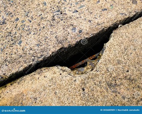 Cracks in concrete floors stock image. Image of domestic - 303680989
