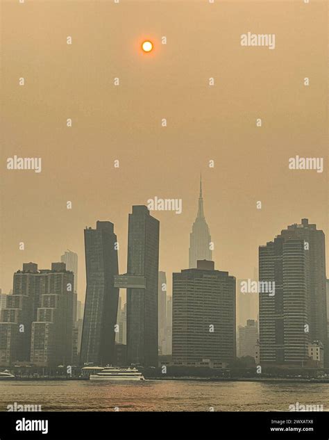 View of Midtown Manhattan covered by the smoke caused by Canadian ...