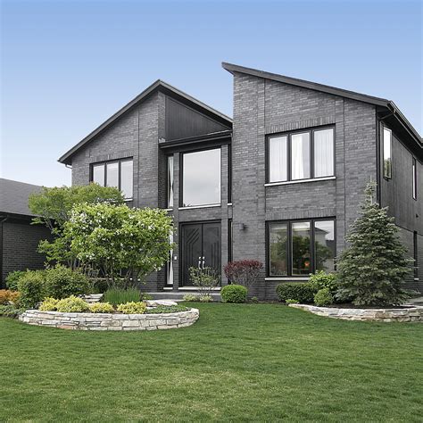Modern gray brick home - HomeSpotter Blog