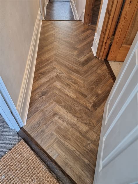 Xylo Urban Herringbone San Francisco Java Brown Laminate Flooring | The ...