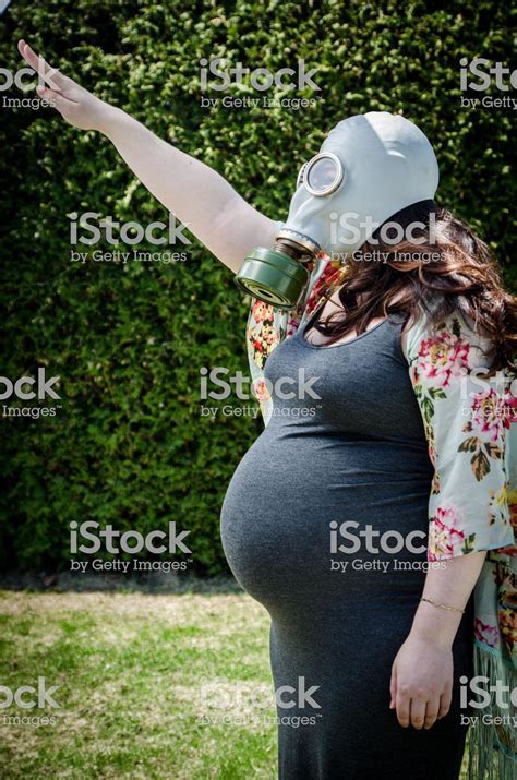 Pregnant gas mask Nazi salute. – Nightmares For Pay