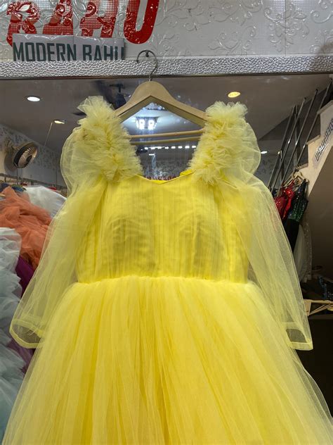 Sunshine Yellow Ruffled Tulle Gown with Sheer Sleeves – Haldi & Party ...