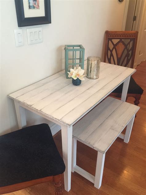 Small farmhouse table for small room. Bench and distressed white washed ...