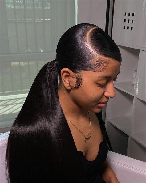 Side Part Sleek Swoop Ponytail With Weave