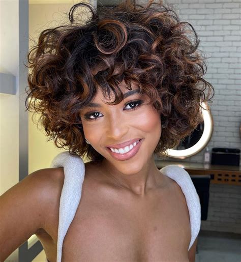 40 Cute Styles Featuring Curly Hair with Bangs