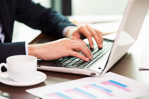 Confident business expert. close-up of man in formalwear working on ...