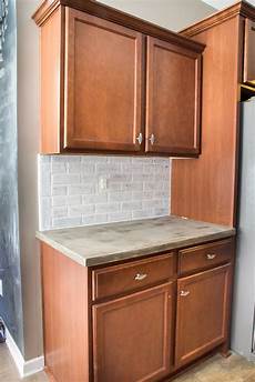 Faux White Brick Backsplash by Remodelaholic Diy Whitewashed Faux Brick Backsplash Faux White Brick Backsplash