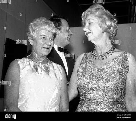 U.S. art collector Peggy Guggenheim, left, talks to her sister Hazel ...