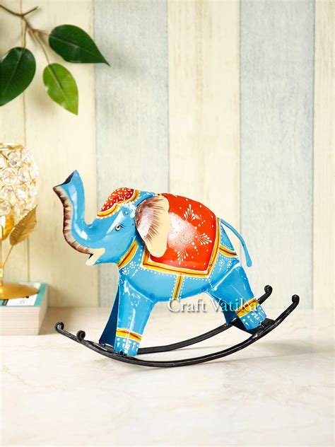 CraftVatika Iron Swing Elephant Trunk Up Showpiece, 9 x 7 x 2 Inches ...