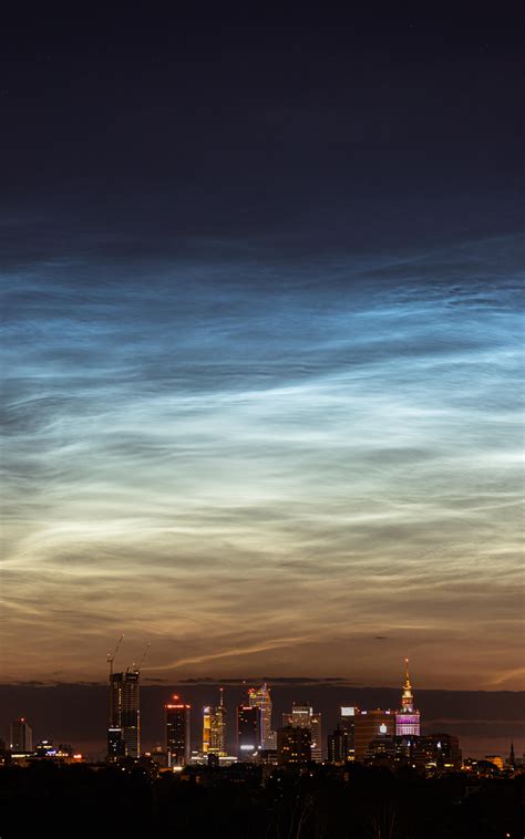 Noctilucent clouds over Warsaw. They glow in darkness of the night. [OC] : r/europe