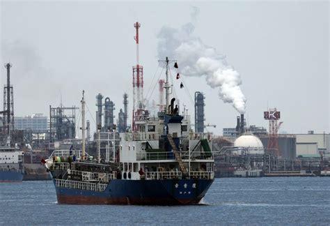 Japan to tap joint oil stockpiles, PM says, with no end seen to supply ...
