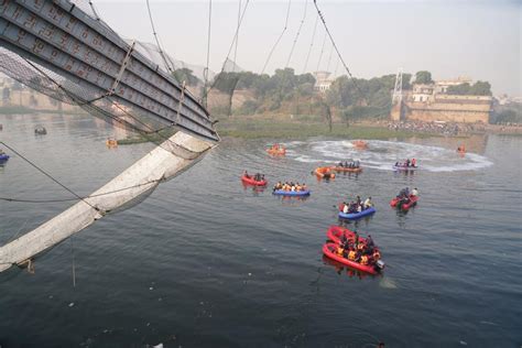 Suspension bridge collapse kills at least 132 in India