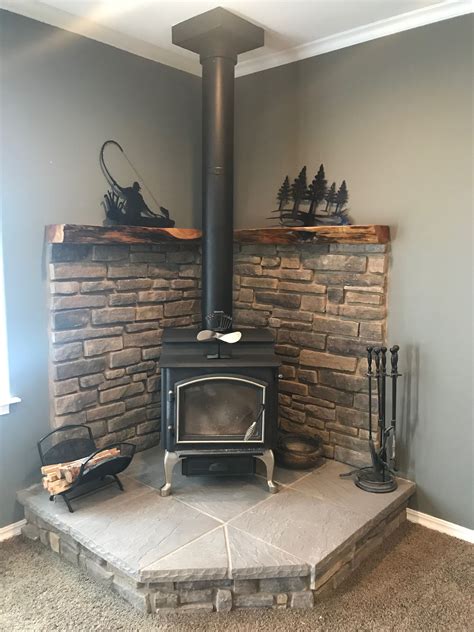 Corner wood stove fireplace with juniper mantel Wood Stove Surround ...
