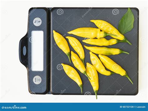 Scale with Hot Lemon Peppers Stock Photo - Image of life, nutrients ...