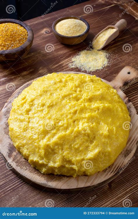 Polenta Cornmeal on Chopping Board Stock Photo - Image of dish ...