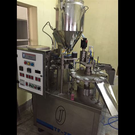 SEMI-AUTOMATIC TUBE FILLING & SEALING MACHINE TF−I... | Jicon ...