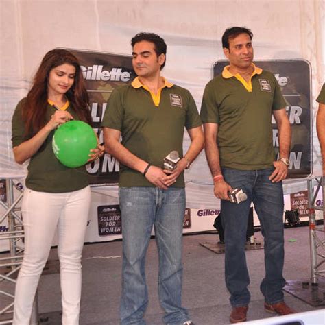 Prachi signs a balloon during the Gillette Soldier for Women campaign ...