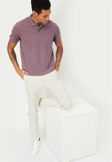 Buy Men Solid Regular Fit Polo T-shirt Online at just Rs. 499.0 ...