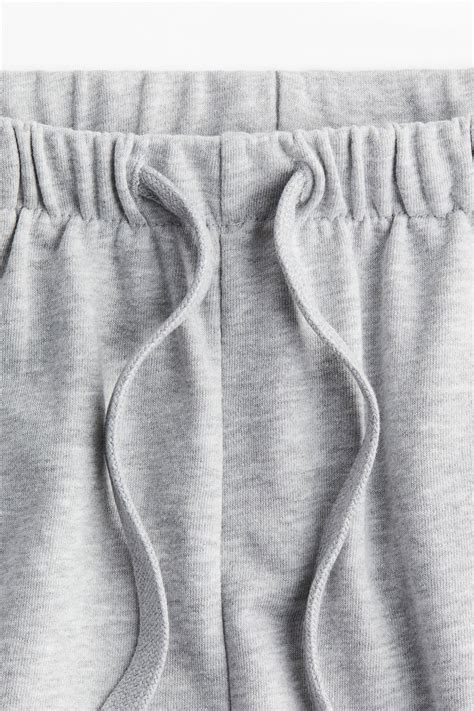 Loose-fit sweatshorts - Light grey marl - Ladies | H&M IN