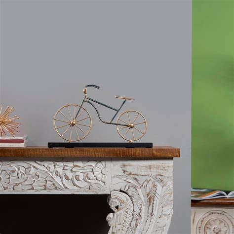 Buy VEDAS Metal Hero Cycle Table Accent from Vedas at just INR 3799.0