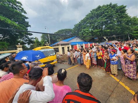 A released prisoner, right, is welcomed by her colleague after she was released from Insein Prison Sunday, Jan. 4, 2026, in Yangon, Myanmar. (AP Photo/Thein Zaw)