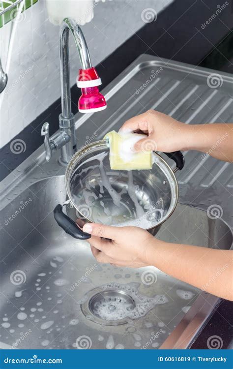 Washing Pans stock image. Image of housekeeping, stainless - 60616819