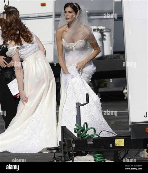 Teri Hatcher dons a wedding gown to film a scene for Desperate Housewives. Also on set were Eva ...