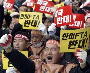 韩国7万工人游行反对韩美自由贸易协定(图)_新闻中心_新浪网