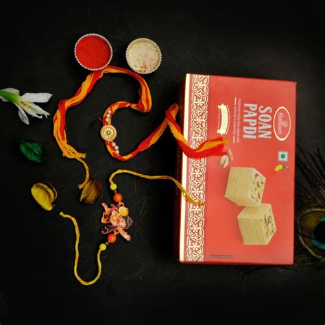 Send Elegant Artisan Rakhi with Soan Papdi Online