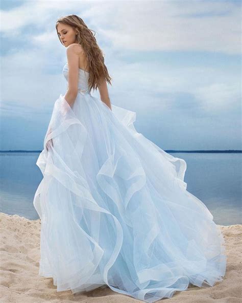 A light sky blue bohemian wedding dress. Ideal for a beach wedding! Designer unknown. #wedding # ...