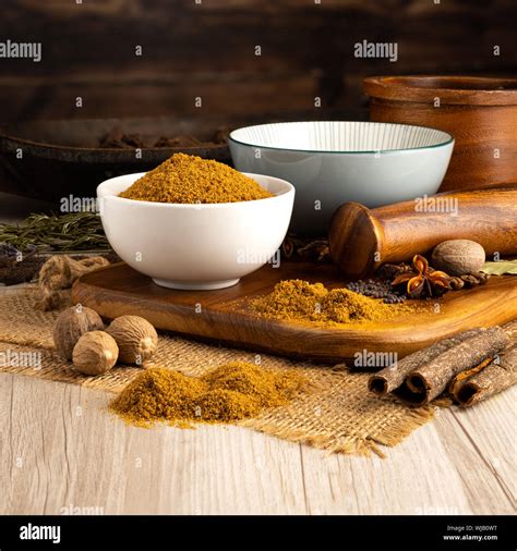 Dry Ground Cumin Powder in a Bowl and with a kitchen setting Stock Photo - Alamy