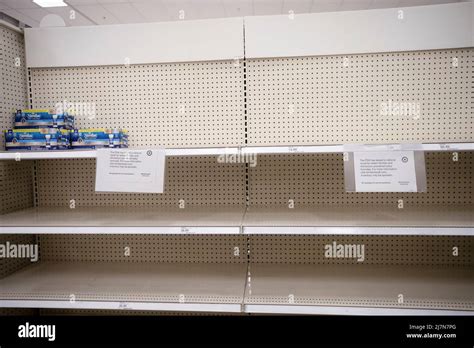 A baby formula display sits nearly empty at a Target store in Orlando.